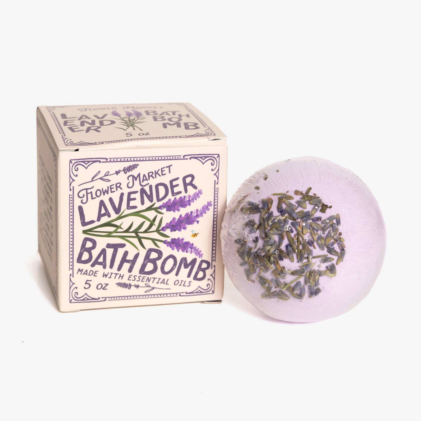 Lavender bath bomb with packaging on a white background