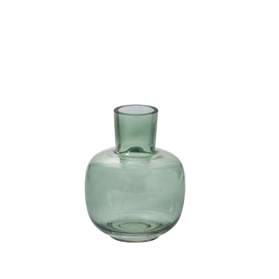 Green glass vase on a white background