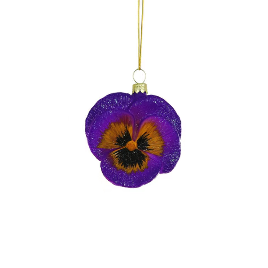 Purple glittery flower ornament with a gold hook on a white background