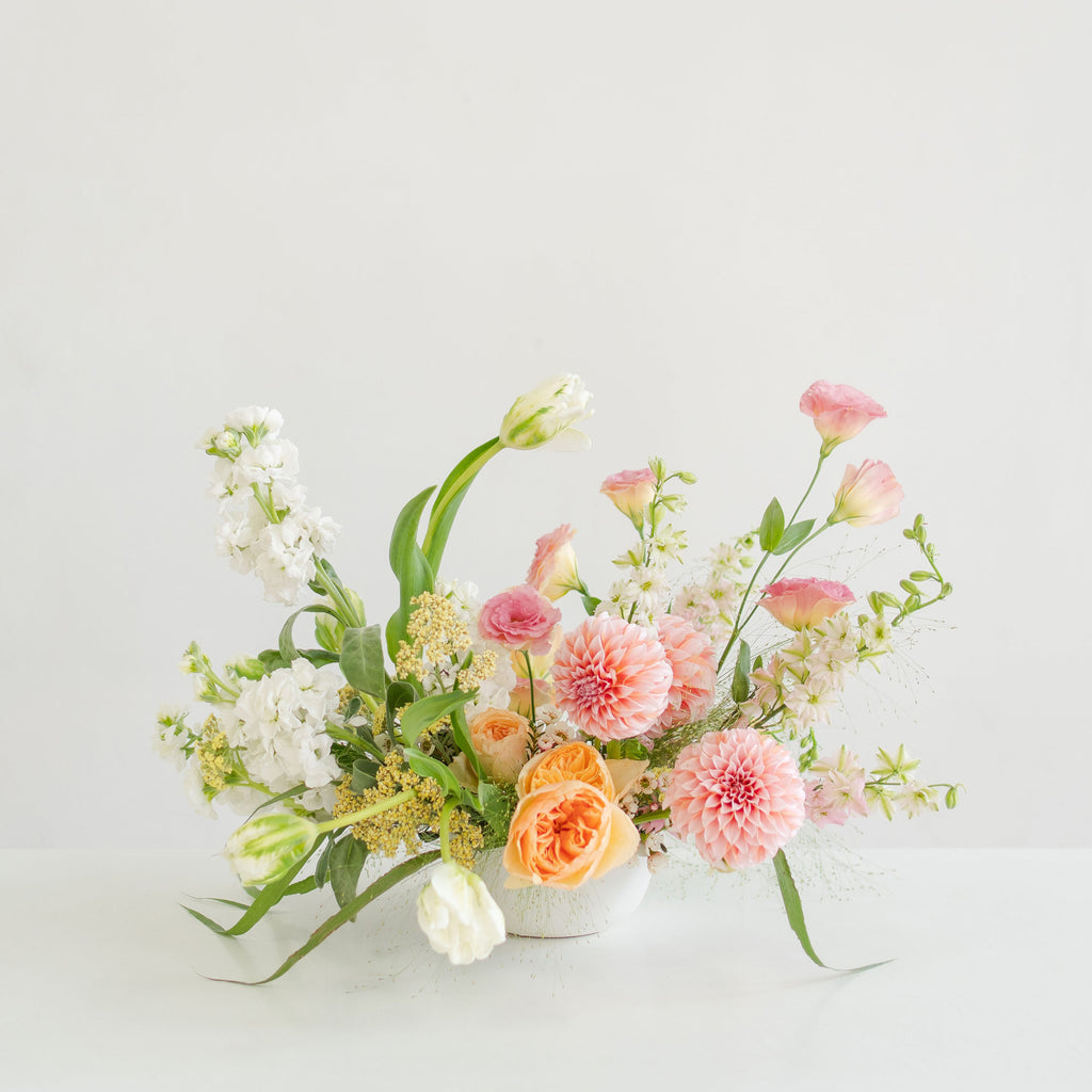 Classic centerpiece flower arrangement in a low bowl from Native Poppy in San Diego