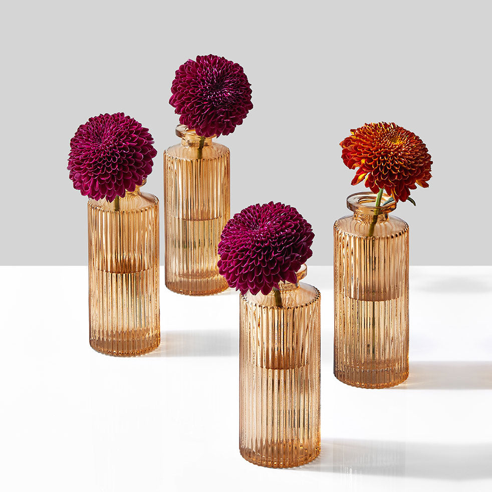 Four Amber Pleated Glass Bud Vases