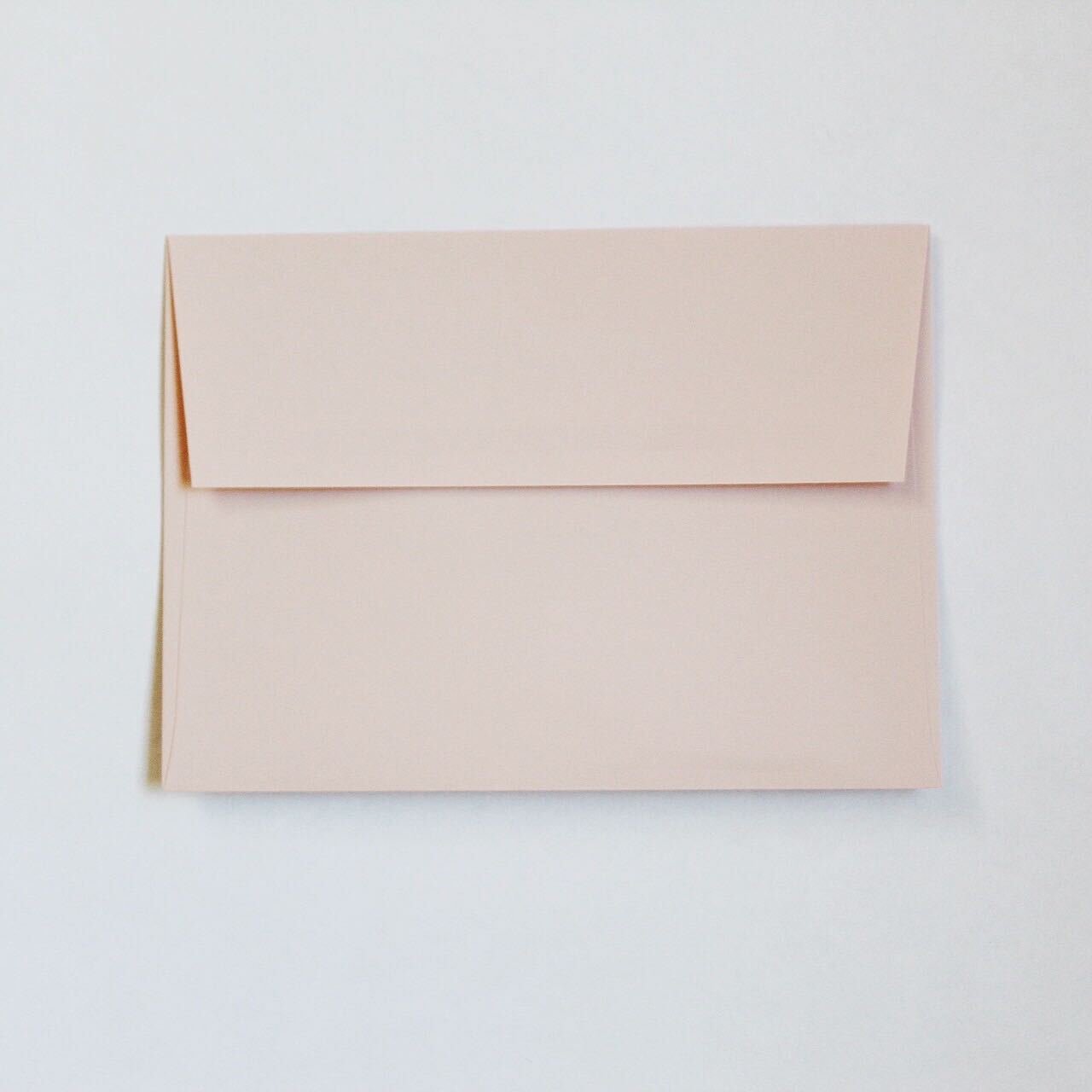 Light blush pink envelope