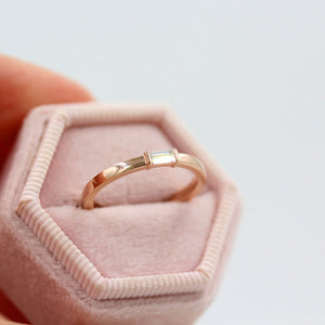 Rose gold baguette diamond ring in pink velvet box