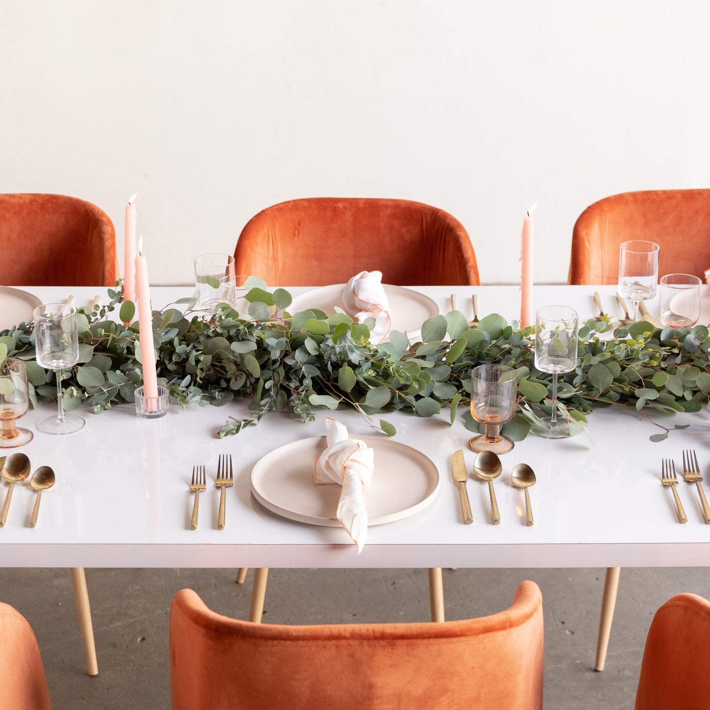 Green eucalyptus garland at a formal event