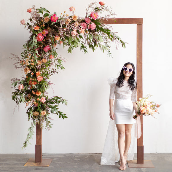 Floral wedding arch designed by Native Poppy