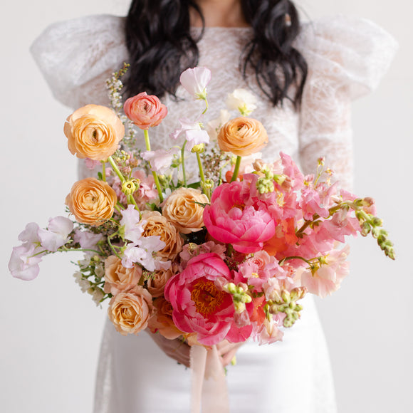 Pink and peach floral bridal bouquet with peonies from Native Poppy