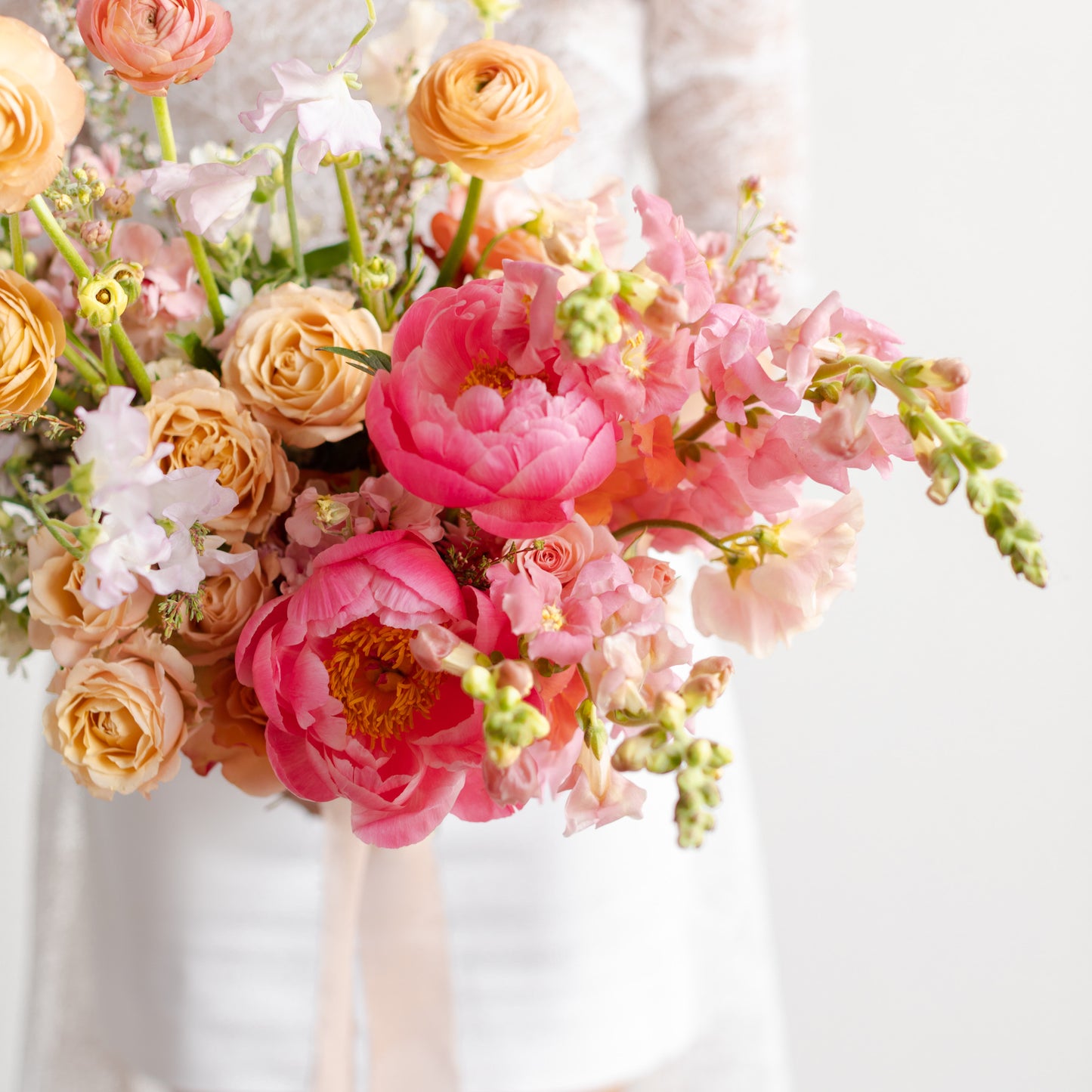 Pink and peach floral bridal bouquet with peonies from Native Poppy