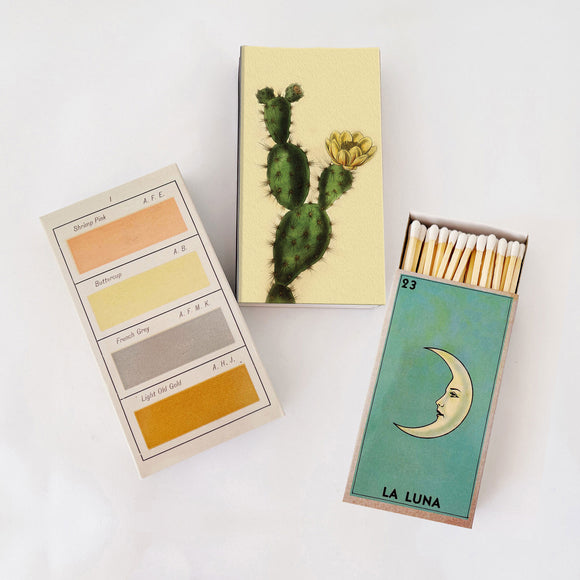 Decorative match boxes in color swatch and loteria styles
