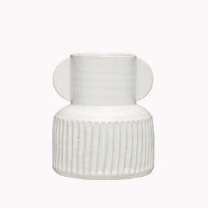 White ceramic vase with vertical striped carving