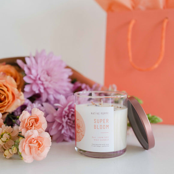 Super Bloom candle and a bouquet of flowers from Native Poppy