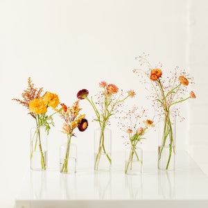 Thanksgiving flowers in glass bud vases