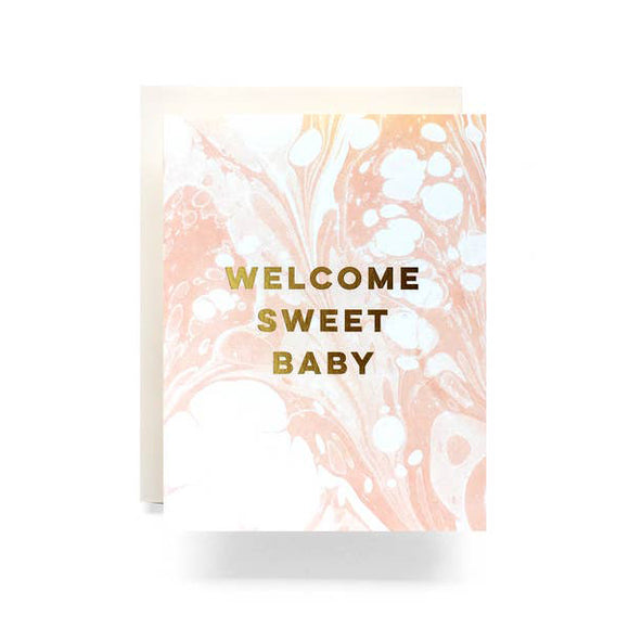 Welcome sweet baby card with pink ad white marble background